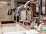 multiple kitchen faucets in showroom