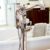 bathtub faucet in silver with two nozzles