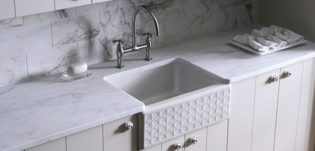 kohler white sink fancy bib